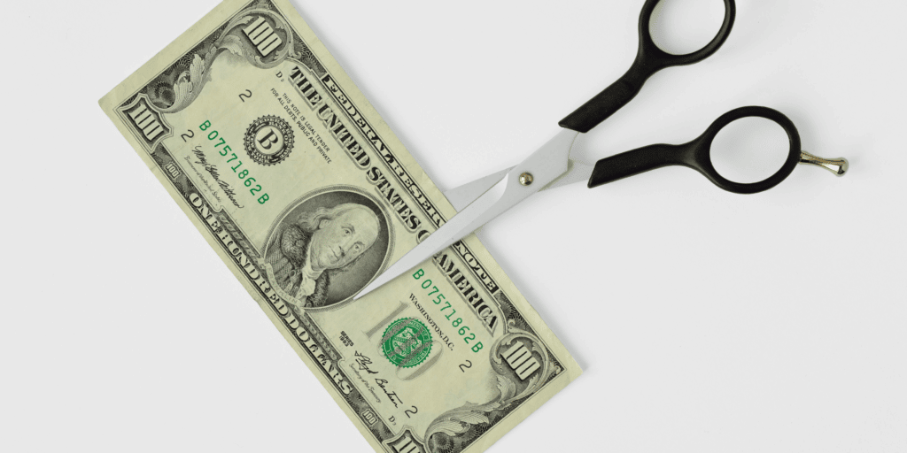 money and scissors
